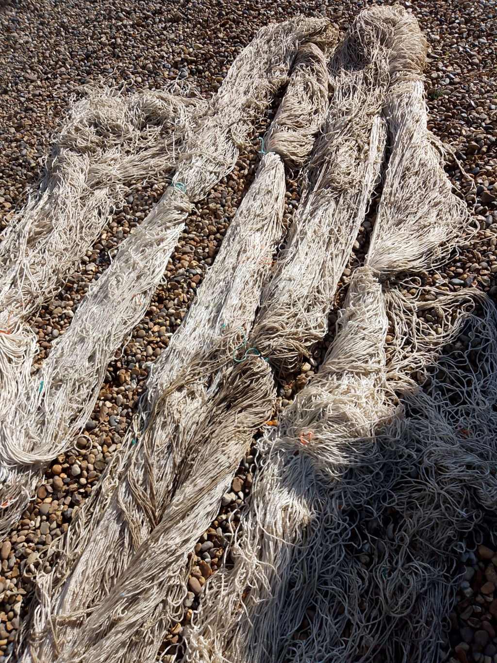 A SHEET OF LARGE MESH NYLON NETTING